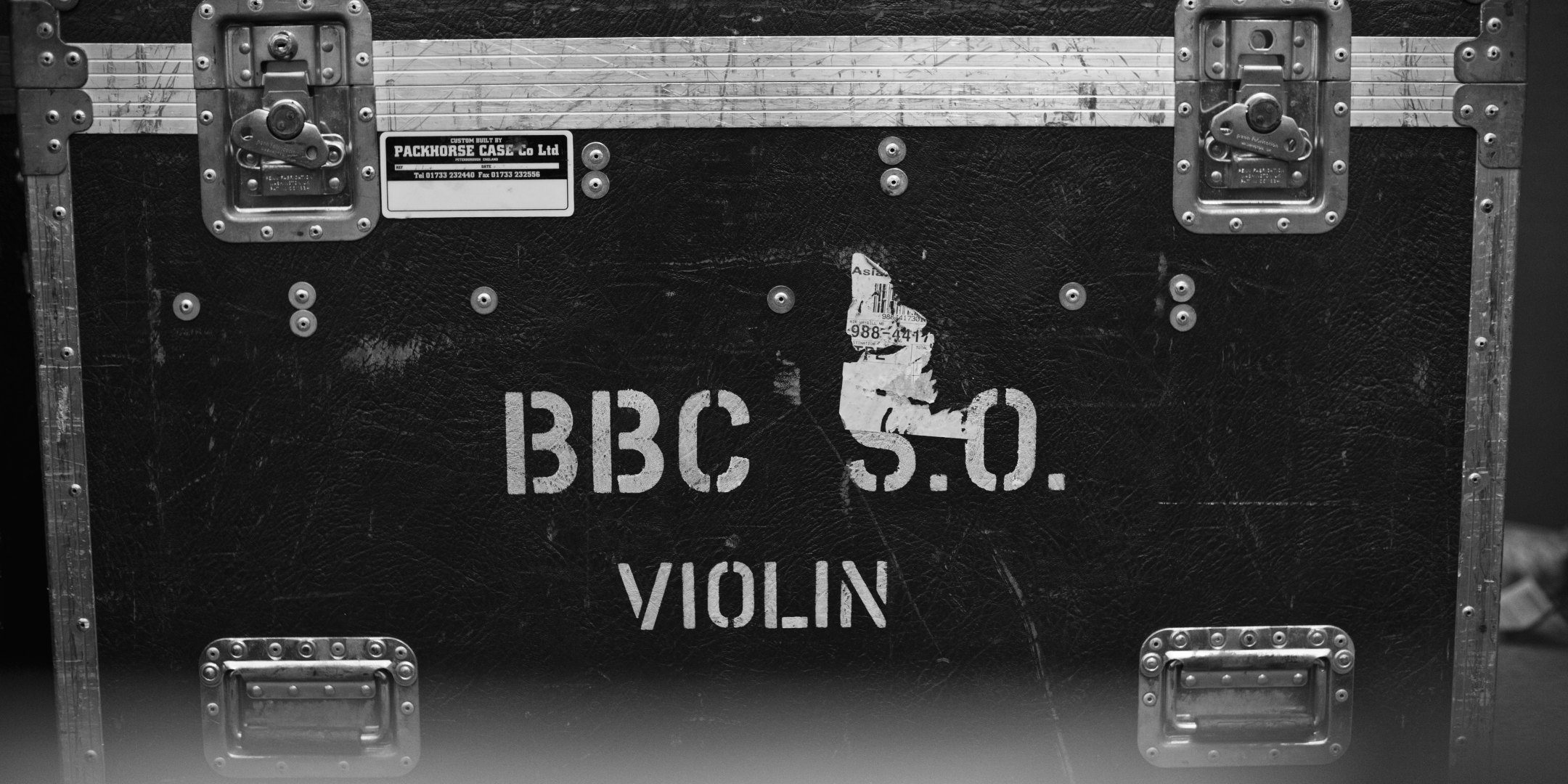 A flight case stencilled BBC S.O. Violin